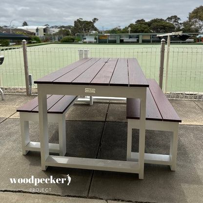 Merbau outdoor table set for balcony use, featuring a natural finish and perfect for intimate dining experiences