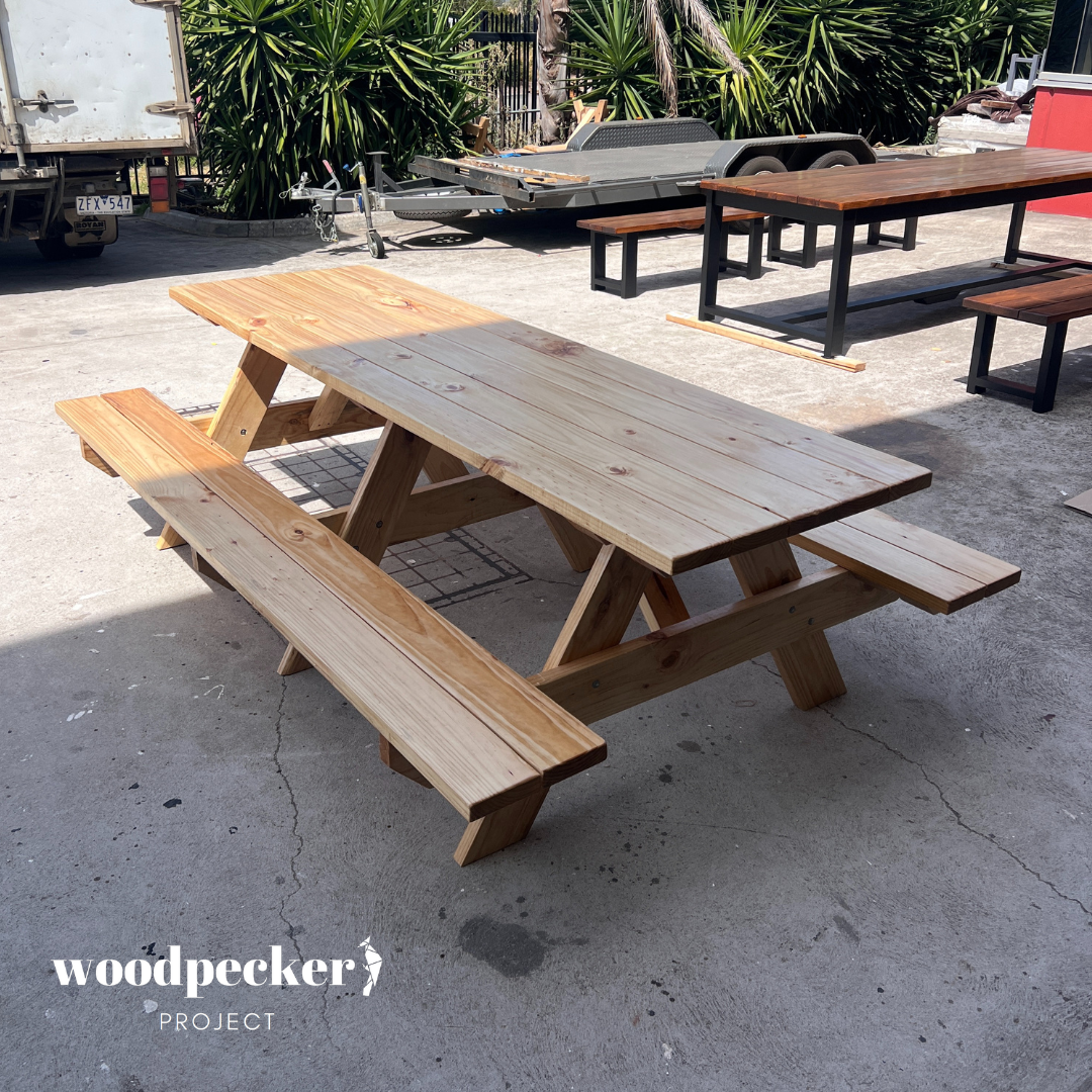 Enjoy the natural beauty of acacia wood with this hardwood picnic table, crafted for durability and resistance to decay and insects, providing a reliable outdoor dining solution for picnics, campgrounds, and parks.