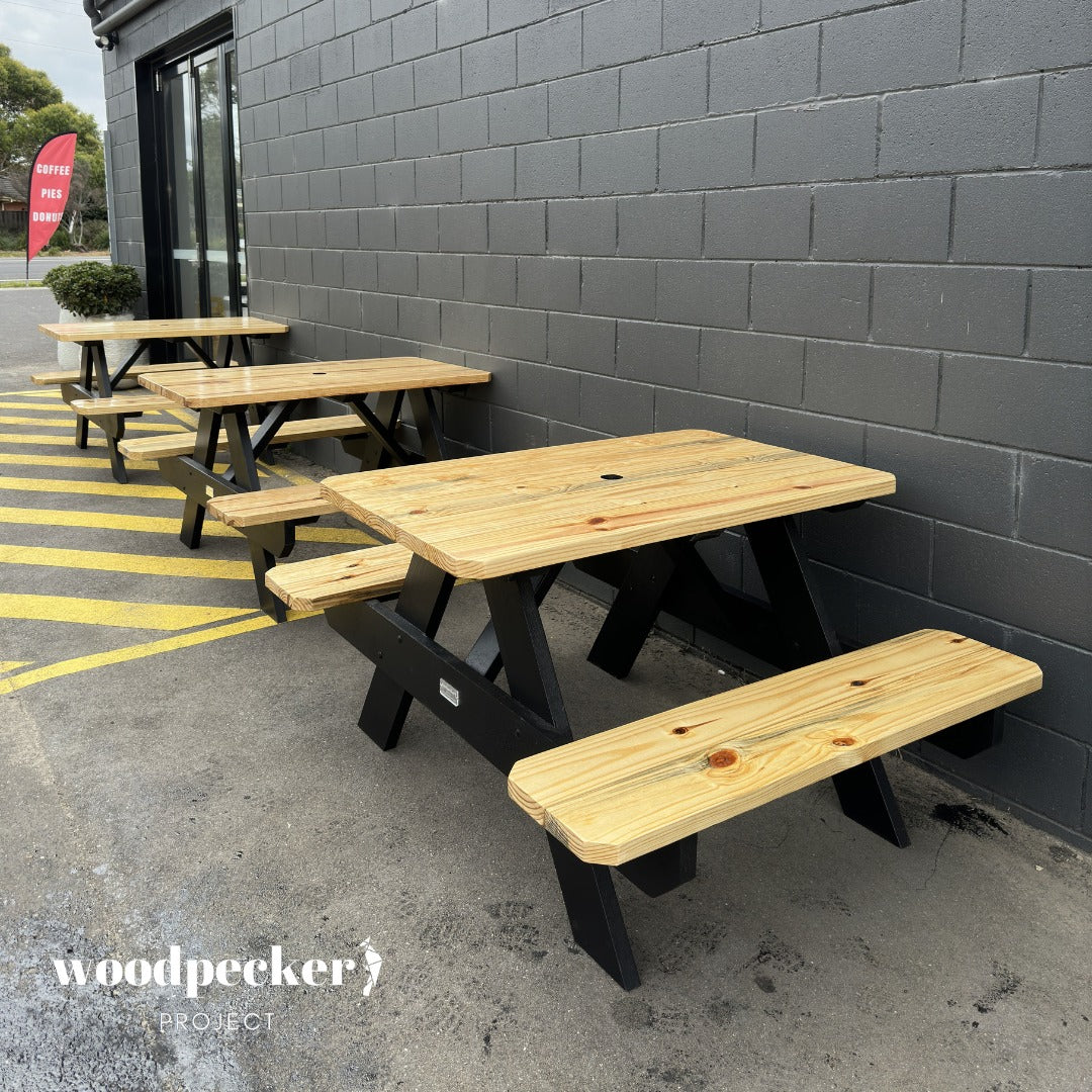 Constructed from solid wood, this picnic table is built to withstand the elements, making it an ideal choice for parks and recreation areas, ensuring enduring enjoyment for all who gather.