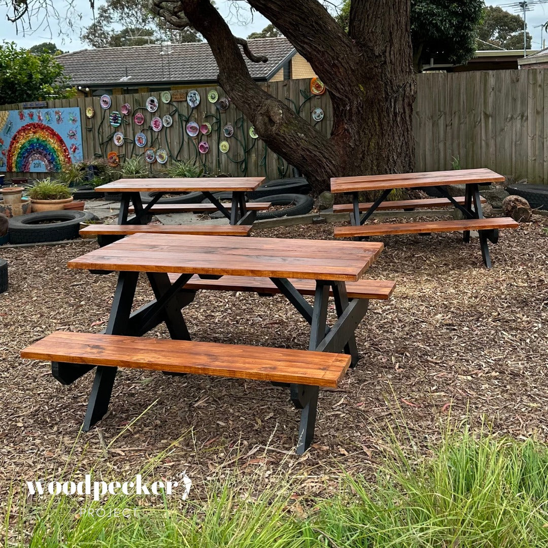 Keep it classic with this traditional picnic table, evoking nostalgia and warmth as you gather with loved ones for picnics and leisurely meals, surrounded by the beauty of nature