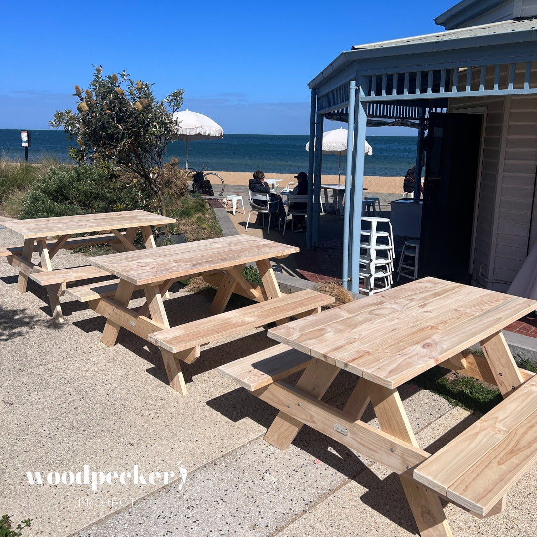 Crafted from durable oak, this rustic picnic table with attached benches is perfect for accommodating large gatherings, making it an ideal choice for family BBQs, outdoor parties, and picnics in the park