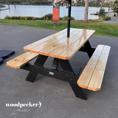 With its robust design, this picnic table is ready to handle picnics and parties with ease, offering a sturdy surface for dining and socializing amidst the beauty of the outdoors