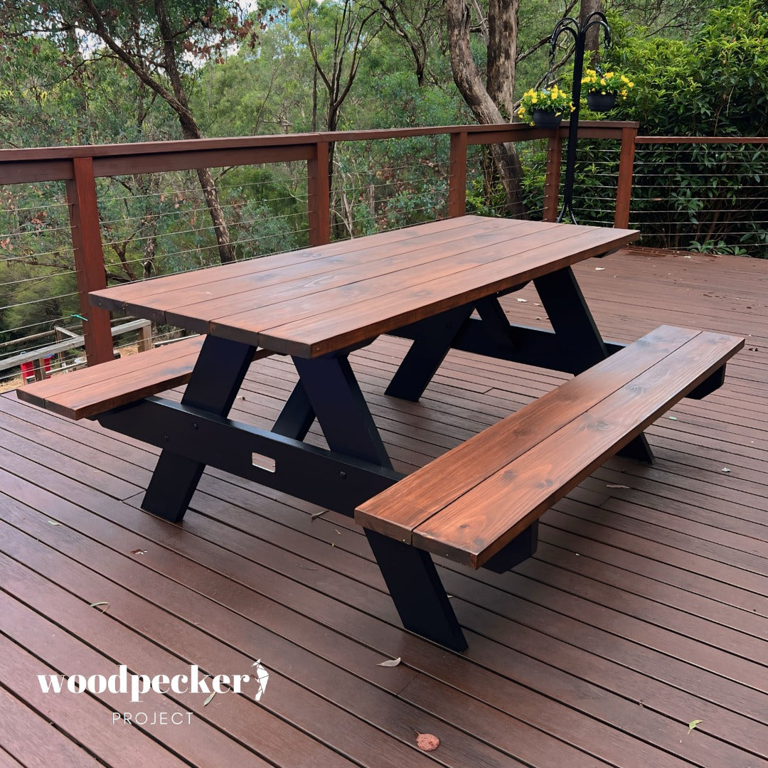 Built tough and built to last, this heavy-duty picnic table is the ultimate outdoor dining companion, providing a reliable surface for countless meals and memories under the open sky.