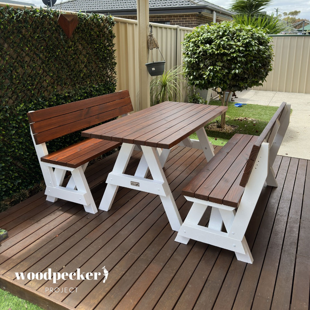 A stylish picnic table set with a spacious wooden table and separated benches with comfortable backrests, perfect for any outdoor setting