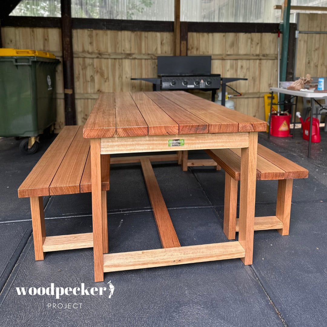 Elevate your outdoor gatherings with this handcrafted solid hardwood table, showcasing a rich wood grain and weather-resistant finish for lasting enjoyment.