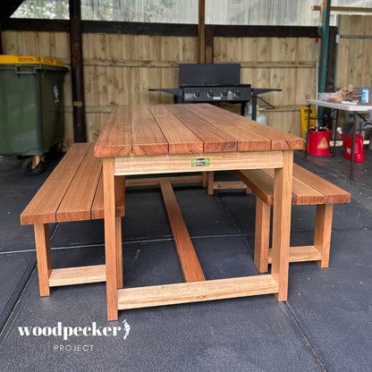 Elevate your outdoor gatherings with this handcrafted solid hardwood table, showcasing a rich wood grain and weather-resistant finish for lasting enjoyment.