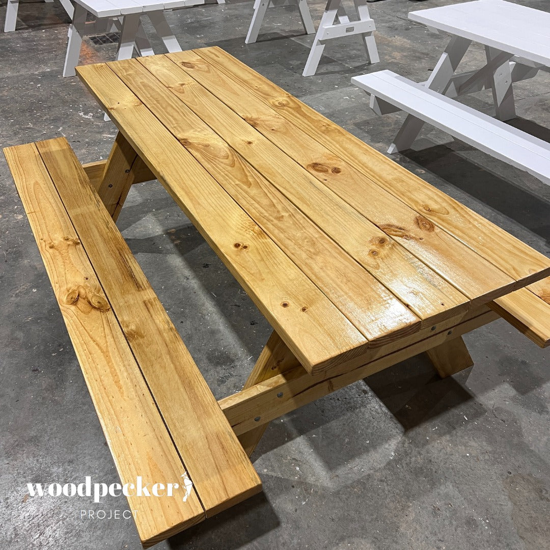 Chic picnic table set crafted from pine and hardwood, perfect for al fresco dining experiences.