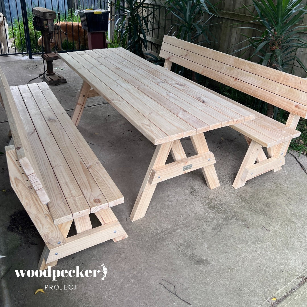 A family-friendly picnic table set with a durable wooden table and backrest-equipped benches, ideal for outdoor dining and entertaining