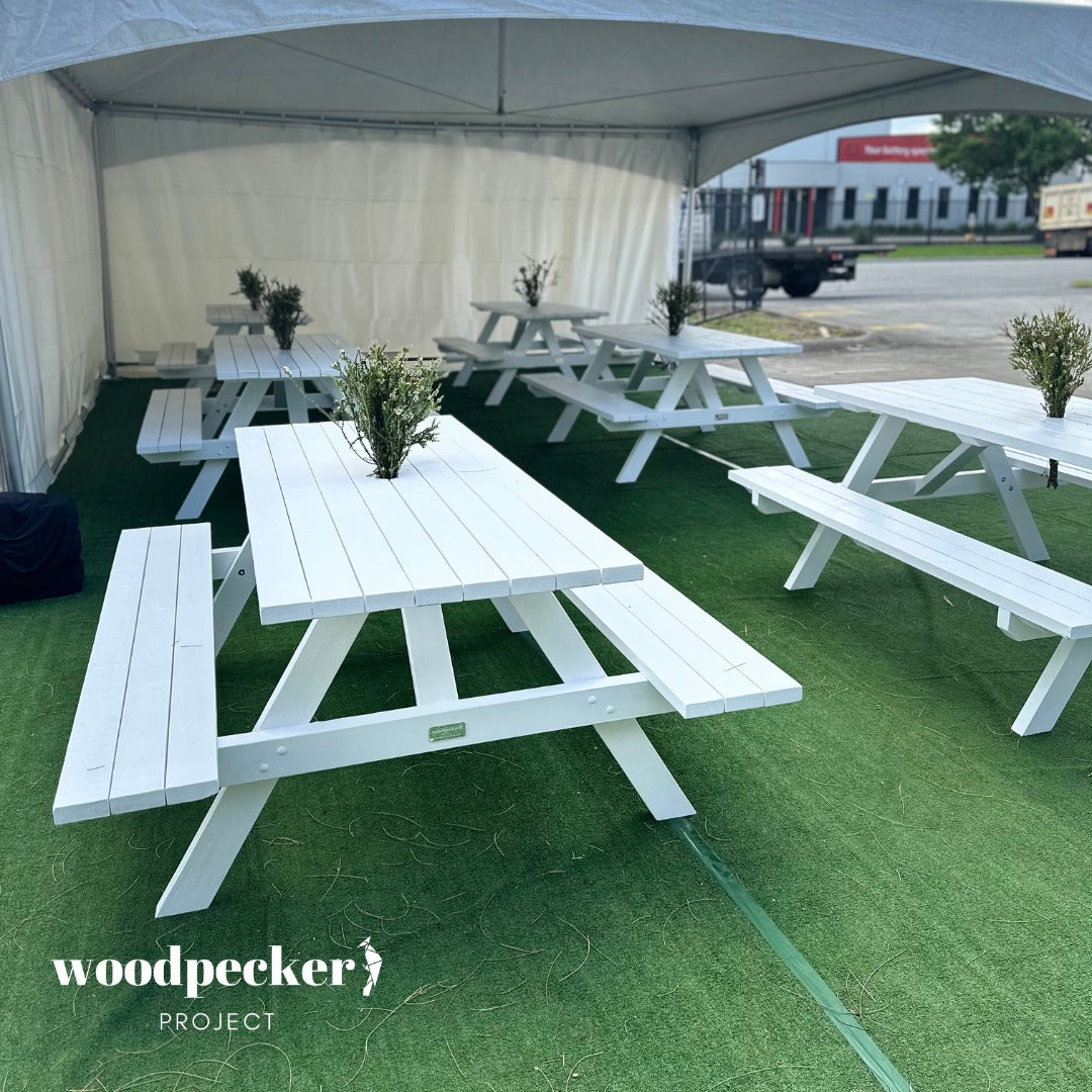 Create lasting memories with our premium white picnic table, designed for hire, offering a spacious and stylish seating option for gatherings of all sizes